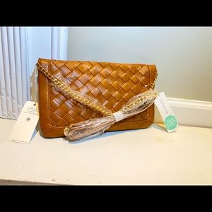 Beautiful leather clutch. Never used.